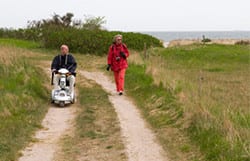 By using an off-road mobility scooter they can hike trails